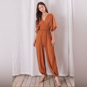 burnt orange jumpsuit